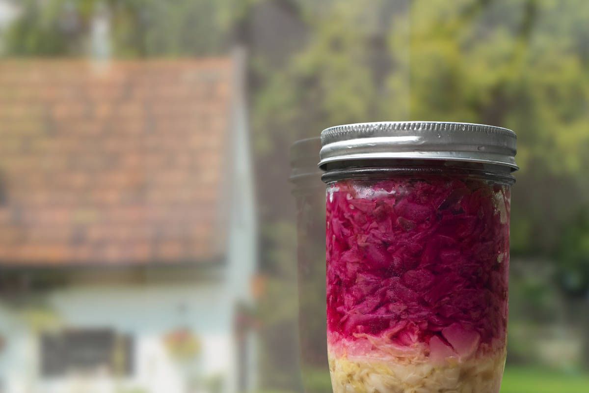 Home-made red and white cabbage sauerkraut mixed in a jar